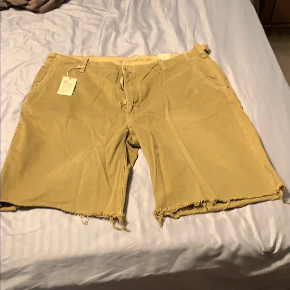 American Eagle size 38 shorts with tattered edges